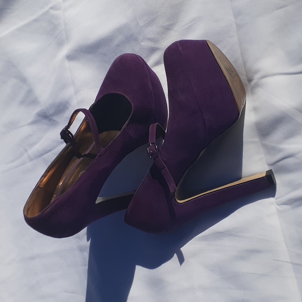 Used size 8 ALDO purple heels